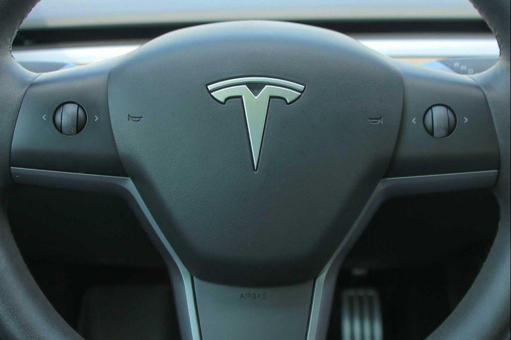 used 2022 Tesla Model 3 car, priced at $28,991