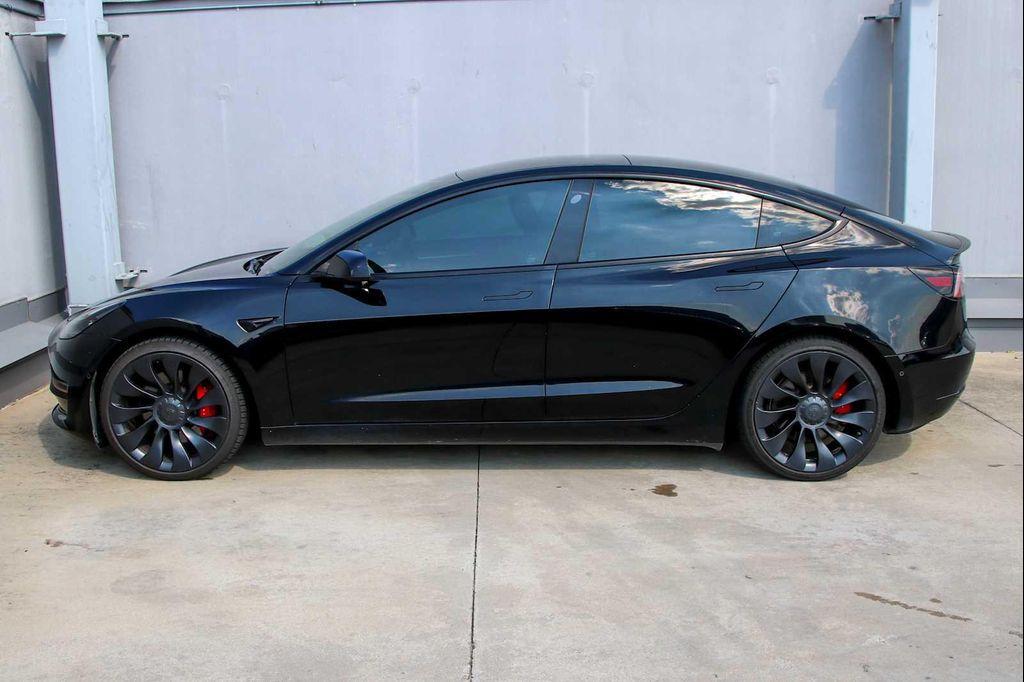 used 2022 Tesla Model 3 car, priced at $28,991