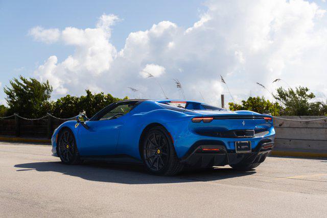used 2024 Ferrari 296 GTS car, priced at $409,900