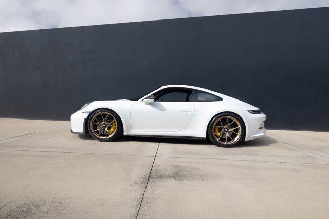 used 2023 Porsche 911 car, priced at $296,900