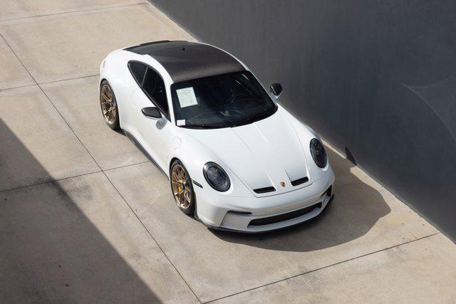 used 2023 Porsche 911 car, priced at $296,900