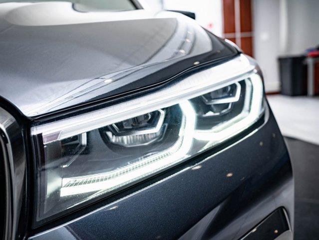 used 2022 BMW 750 car, priced at $62,298