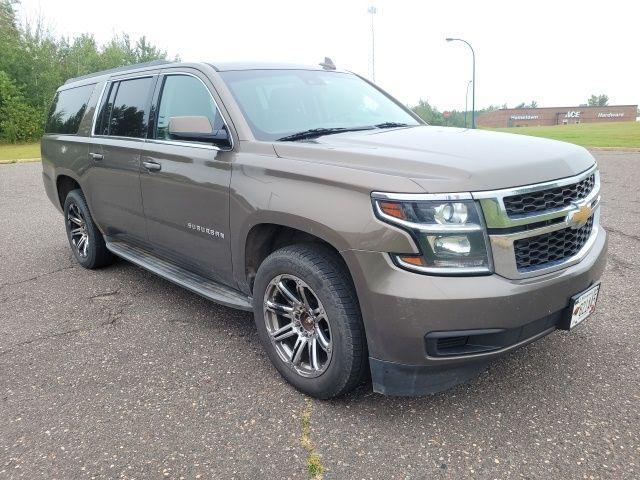 used 2015 Chevrolet Suburban car, priced at $9,000