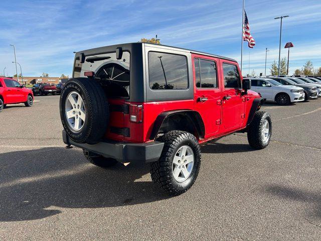 used 2011 Jeep Wrangler Unlimited car, priced at $10,500