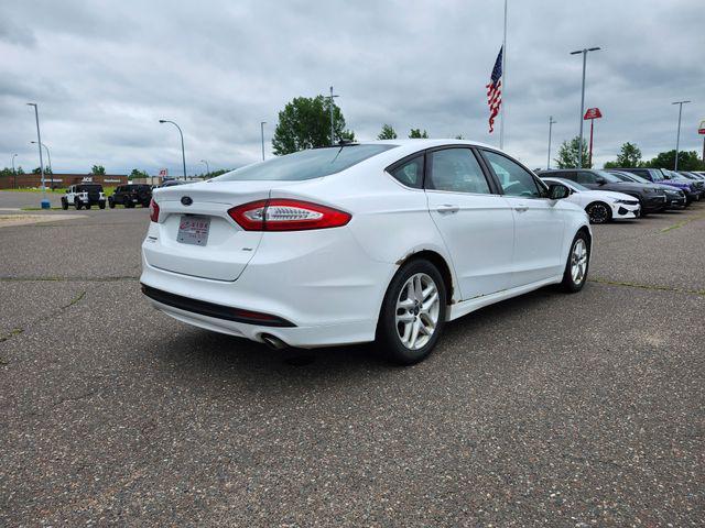 used 2016 Ford Fusion car, priced at $6,000