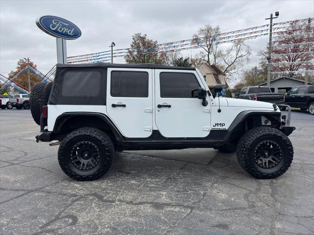 used 2014 Jeep Wrangler Unlimited car, priced at $16,998