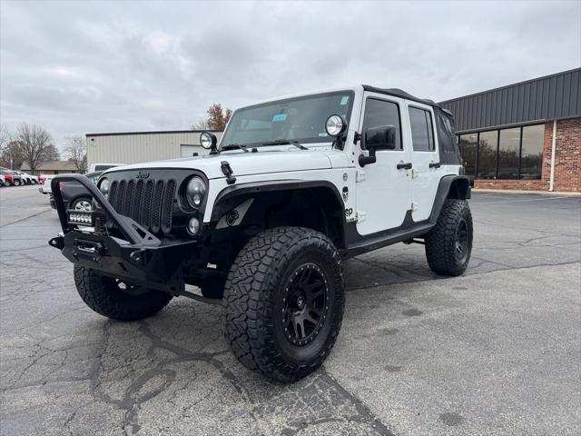 used 2014 Jeep Wrangler Unlimited car, priced at $16,998