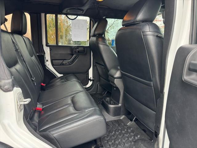 used 2014 Jeep Wrangler Unlimited car, priced at $16,998