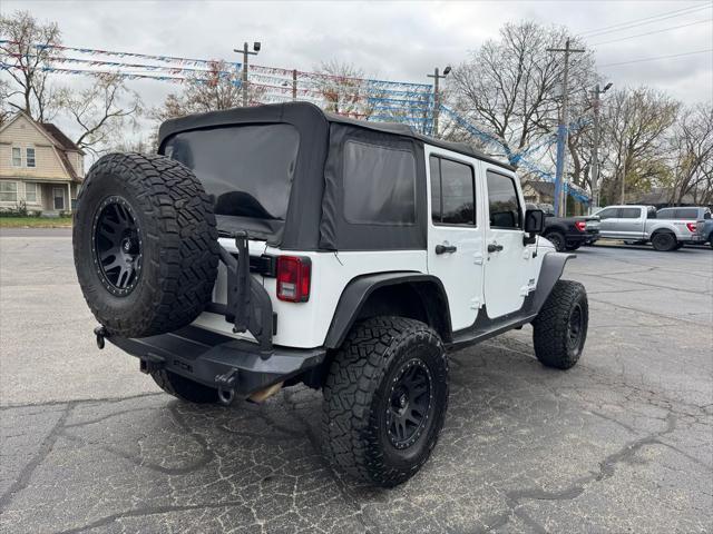 used 2014 Jeep Wrangler Unlimited car, priced at $16,998