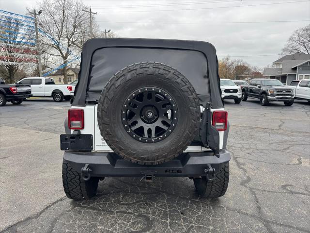 used 2014 Jeep Wrangler Unlimited car, priced at $16,998