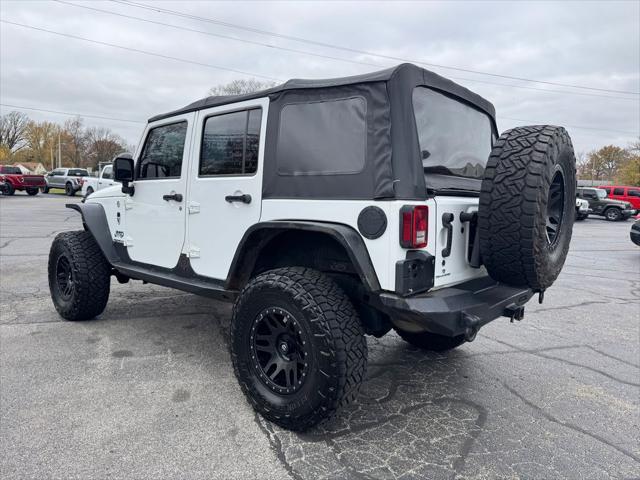 used 2014 Jeep Wrangler Unlimited car, priced at $16,998