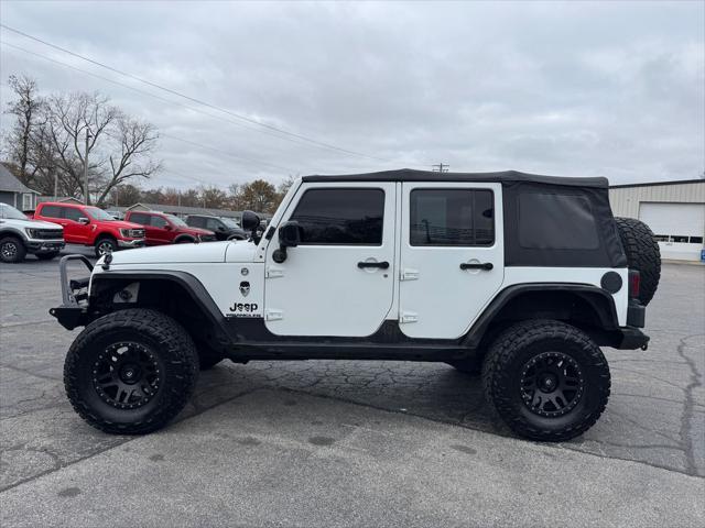 used 2014 Jeep Wrangler Unlimited car, priced at $16,998