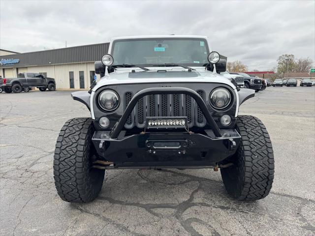 used 2014 Jeep Wrangler Unlimited car, priced at $16,998