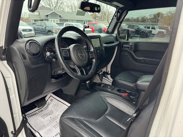 used 2014 Jeep Wrangler Unlimited car, priced at $16,998