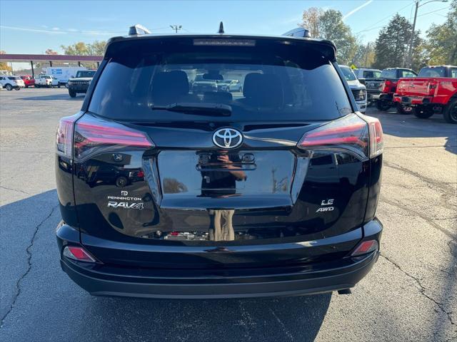 used 2018 Toyota RAV4 car, priced at $19,998