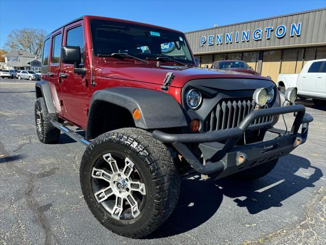 used 2010 Jeep Wrangler Unlimited car, priced at $17,998