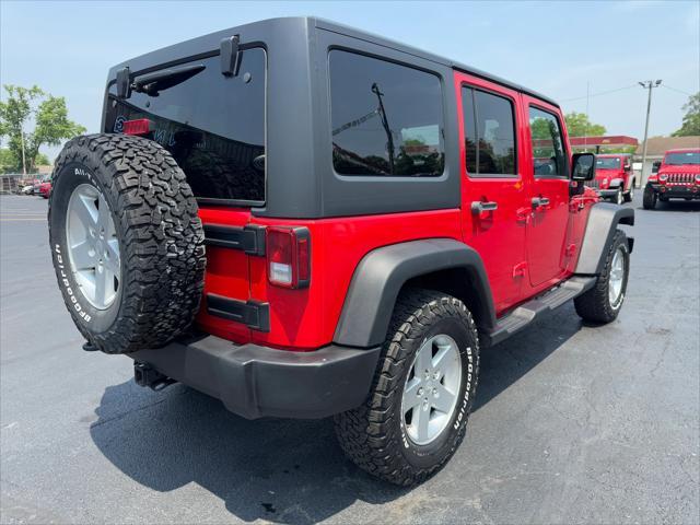 used 2014 Jeep Wrangler Unlimited car, priced at $17,998
