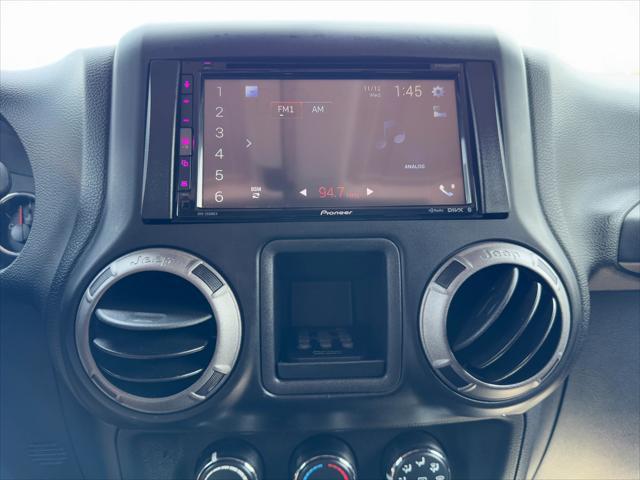 used 2014 Jeep Wrangler Unlimited car, priced at $17,998
