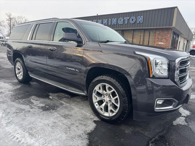 used 2015 GMC Yukon car, priced at $15,200