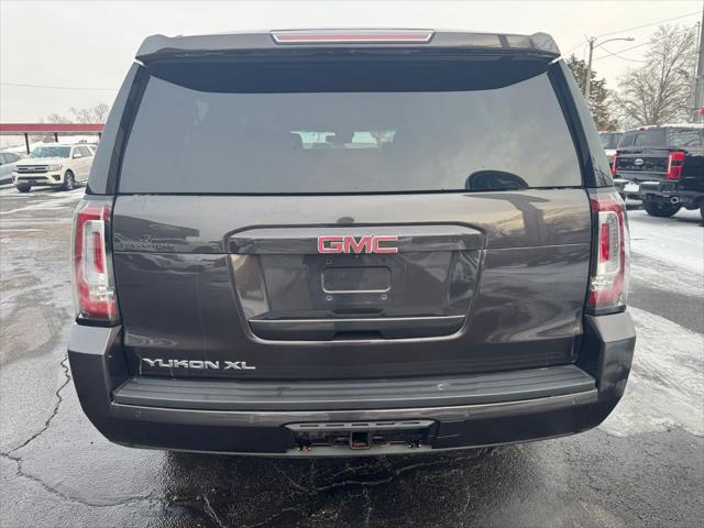 used 2015 GMC Yukon car, priced at $15,200