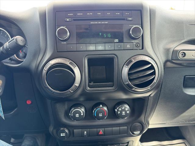 used 2015 Jeep Wrangler car, priced at $16,998