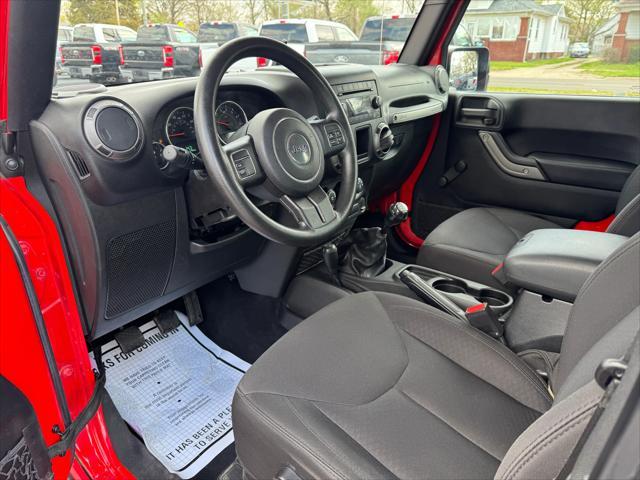used 2015 Jeep Wrangler car, priced at $16,998