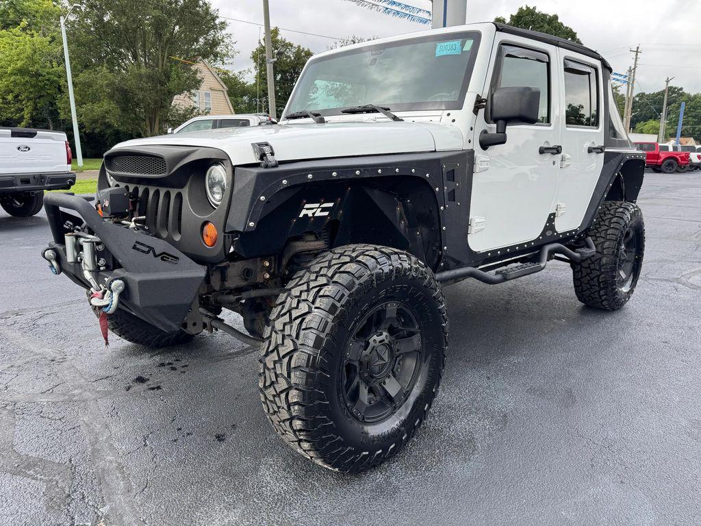 used 2013 Jeep Wrangler Unlimited car, priced at $18,998