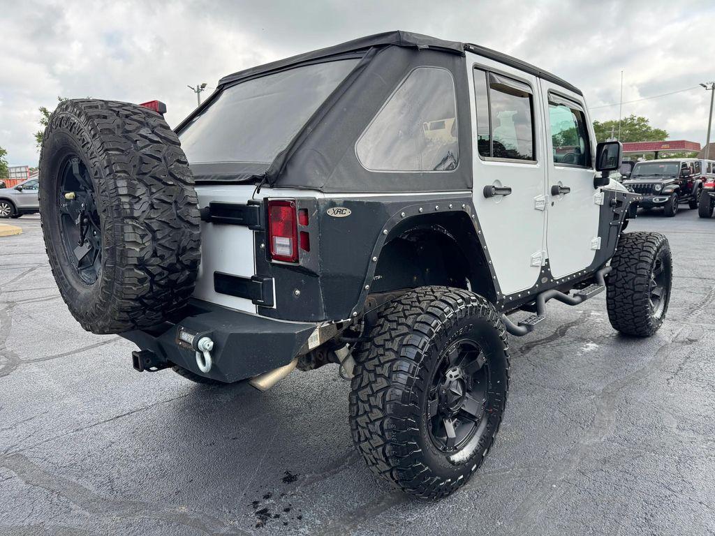 used 2013 Jeep Wrangler Unlimited car, priced at $18,998