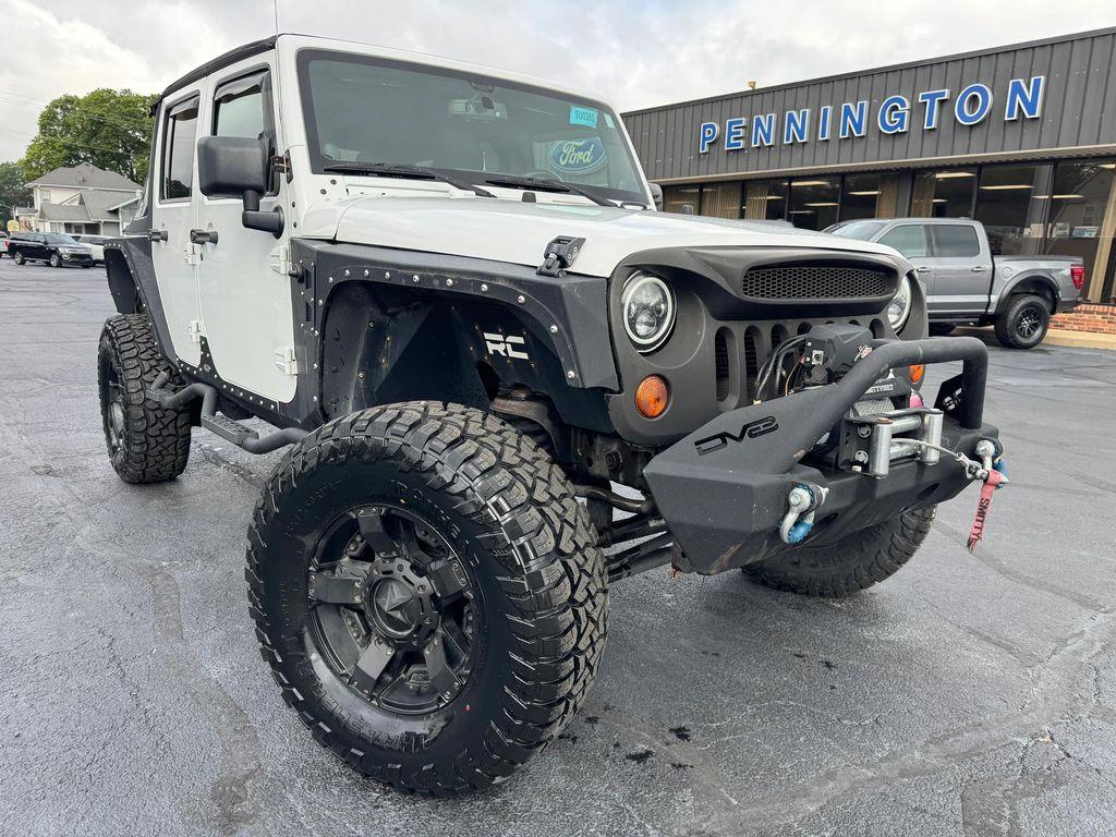 used 2013 Jeep Wrangler Unlimited car, priced at $18,998