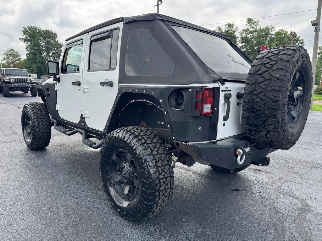 used 2013 Jeep Wrangler Unlimited car, priced at $18,998