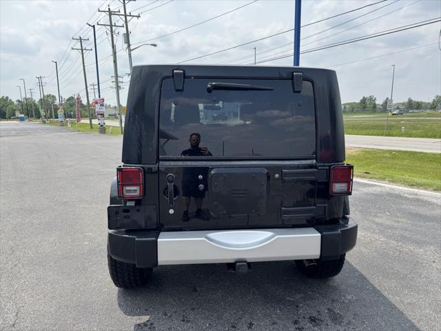 used 2012 Jeep Wrangler Unlimited car, priced at $14,632