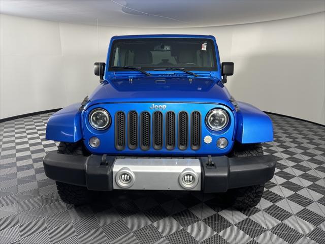 used 2015 Jeep Wrangler Unlimited car, priced at $18,494