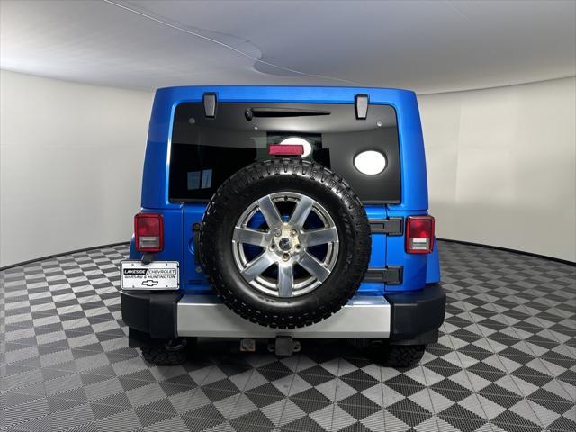 used 2015 Jeep Wrangler Unlimited car, priced at $18,494