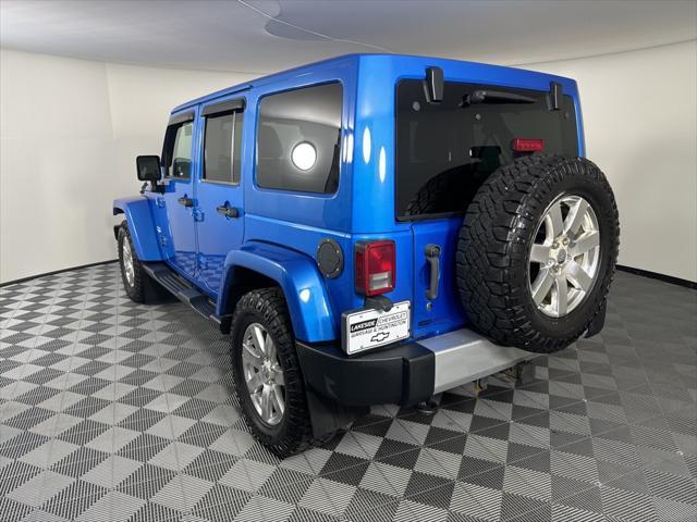 used 2015 Jeep Wrangler Unlimited car, priced at $18,494