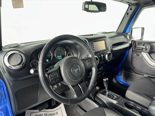 used 2015 Jeep Wrangler Unlimited car, priced at $18,494