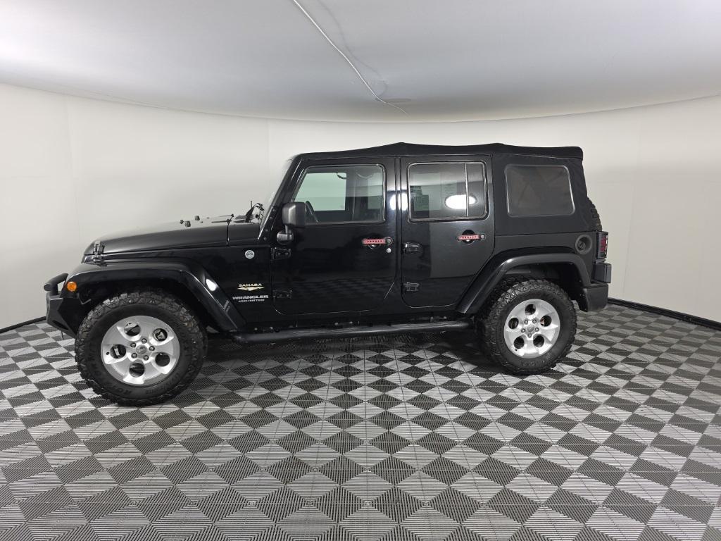 used 2013 Jeep Wrangler Unlimited car, priced at $15,788