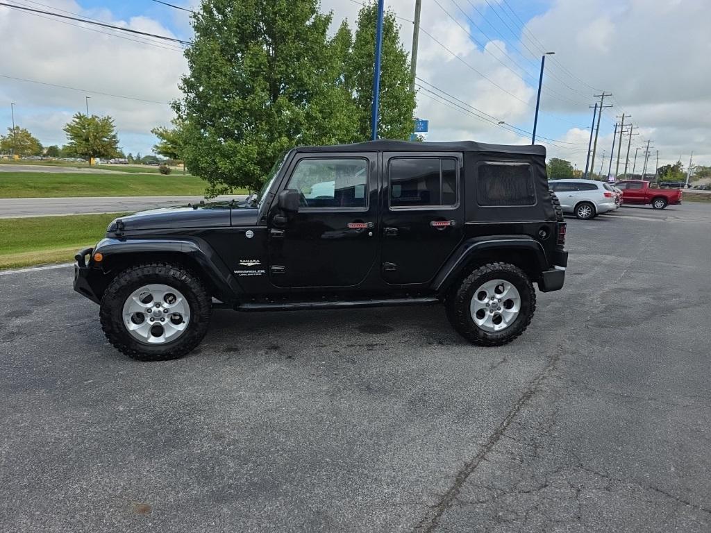 used 2013 Jeep Wrangler Unlimited car, priced at $15,945
