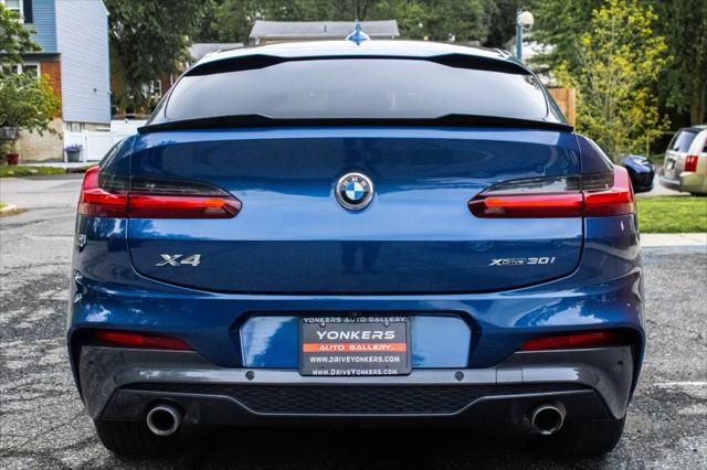 used 2021 BMW X4 car, priced at $29,665