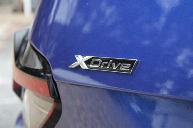 used 2023 BMW 230 car, priced at $32,250