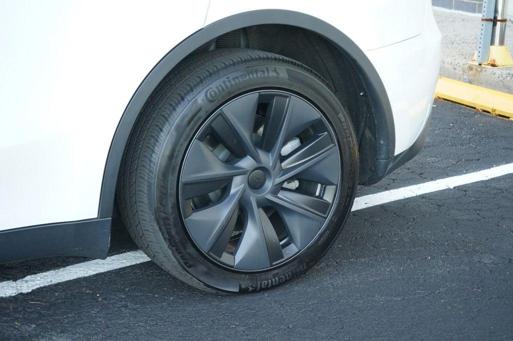 used 2025 Tesla Model Y car, priced at $41,260