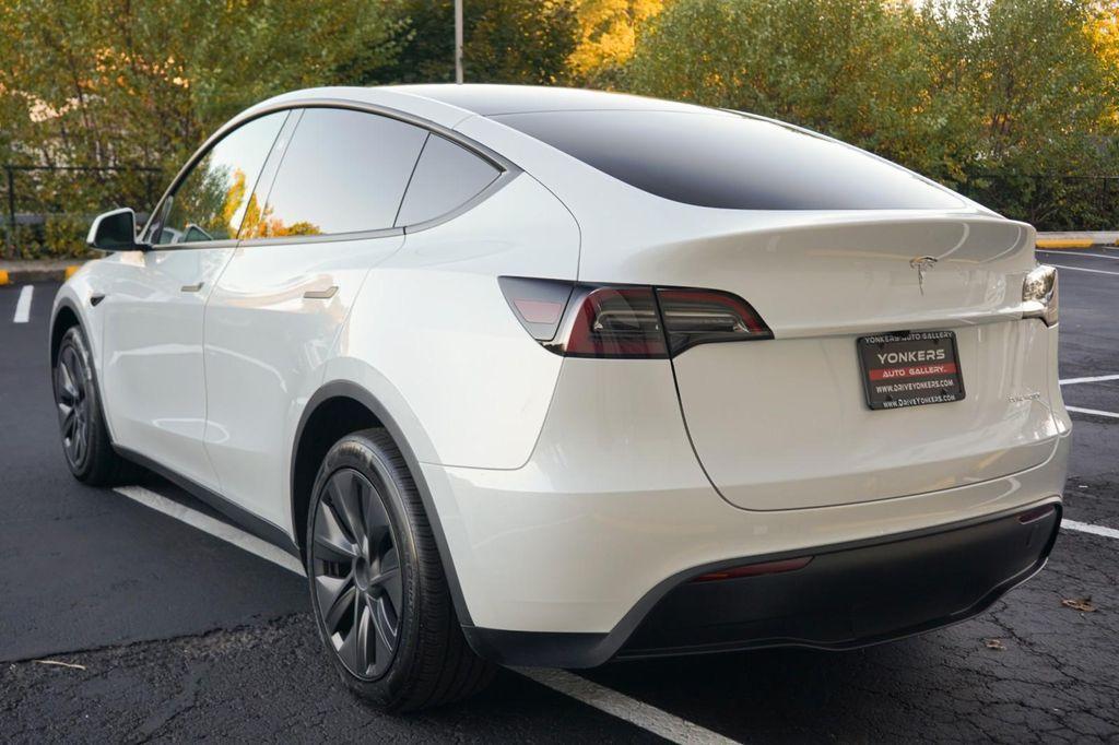 used 2025 Tesla Model Y car, priced at $41,260