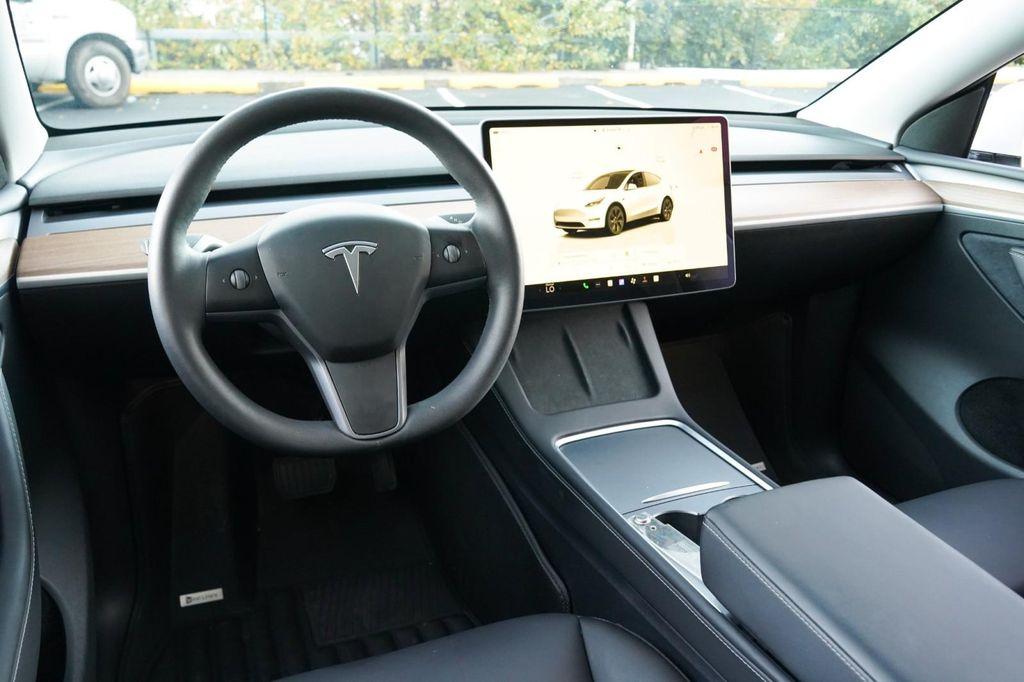 used 2025 Tesla Model Y car, priced at $41,260