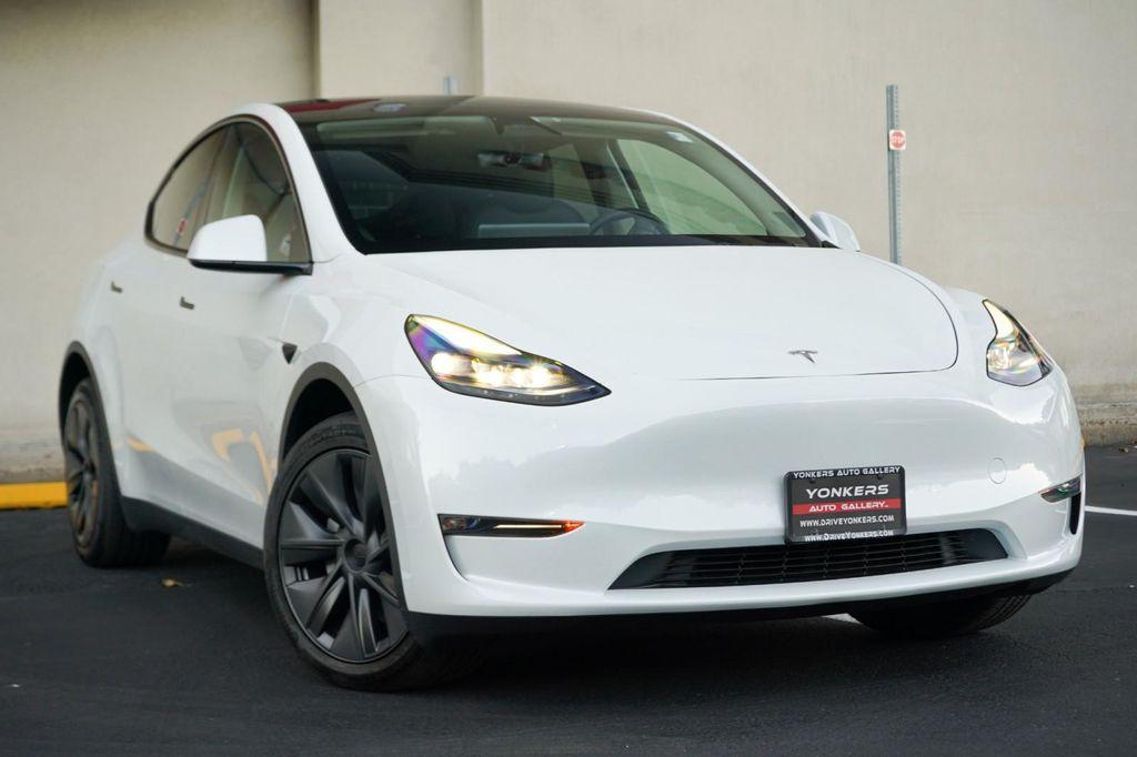 used 2025 Tesla Model Y car, priced at $41,260