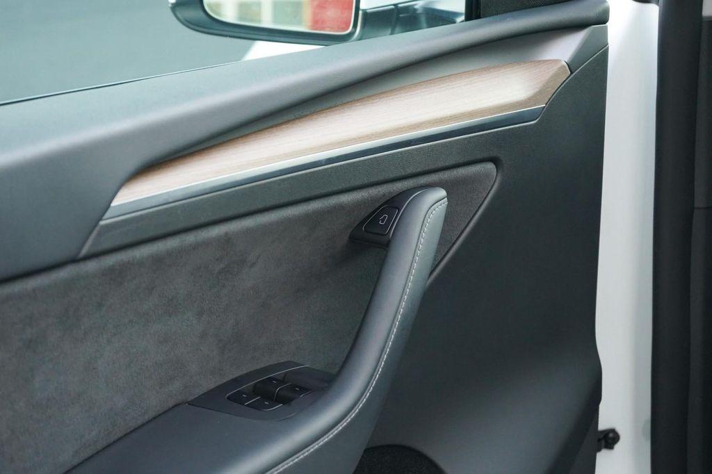 used 2025 Tesla Model Y car, priced at $41,260