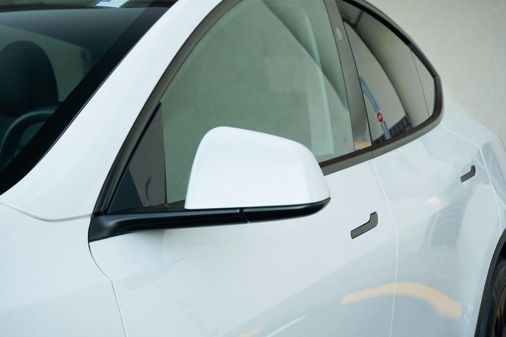 used 2025 Tesla Model Y car, priced at $41,260