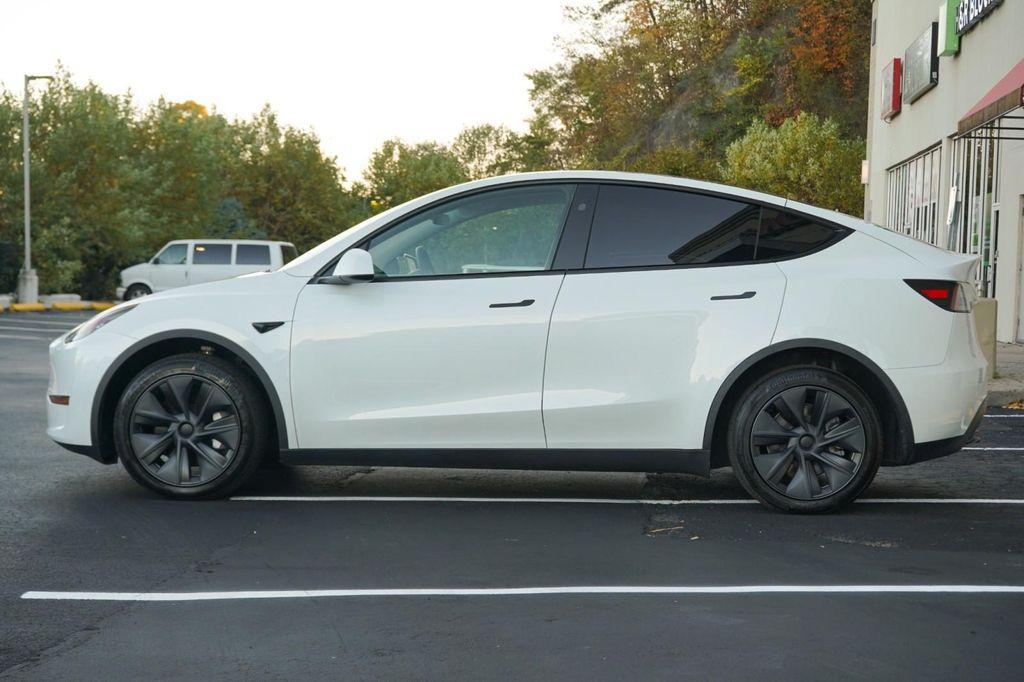 used 2025 Tesla Model Y car, priced at $41,260