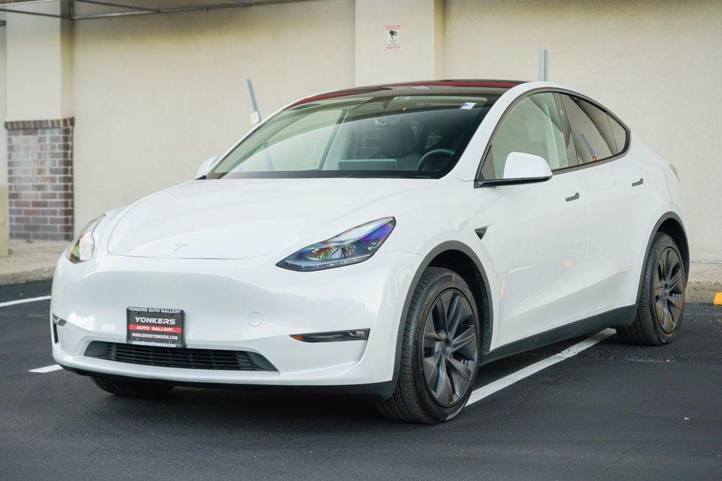 used 2025 Tesla Model Y car, priced at $41,260