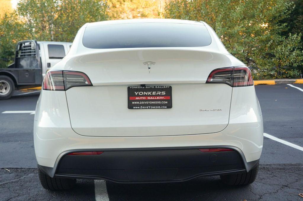 used 2025 Tesla Model Y car, priced at $41,260