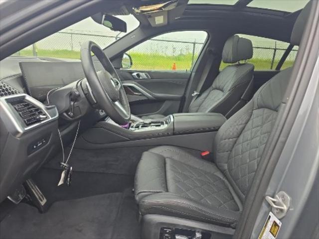 used 2025 BMW X6 car, priced at $63,450