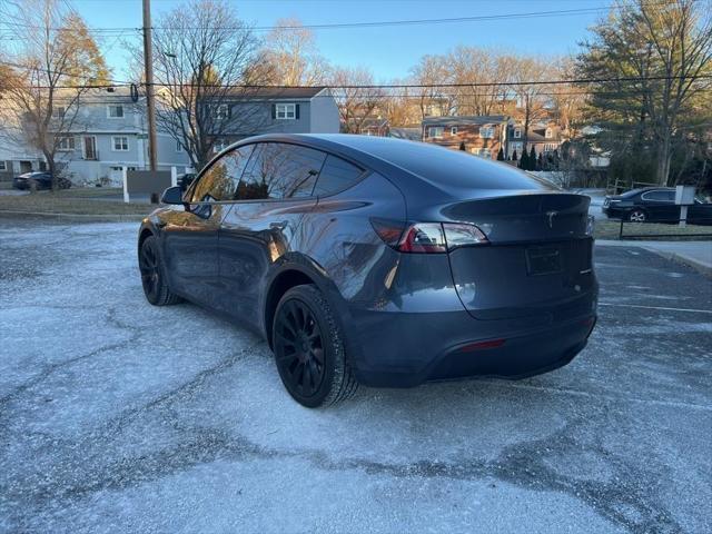 used 2023 Tesla Model Y car, priced at $32,705